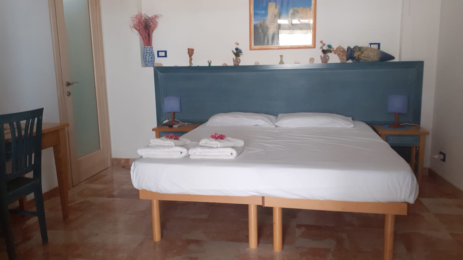 camera-scilla-con-cucina-veranda